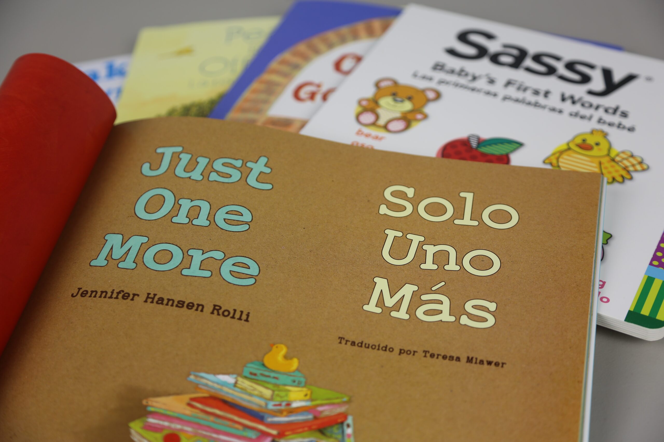 Bilingual Imagination Library books including Just One More
